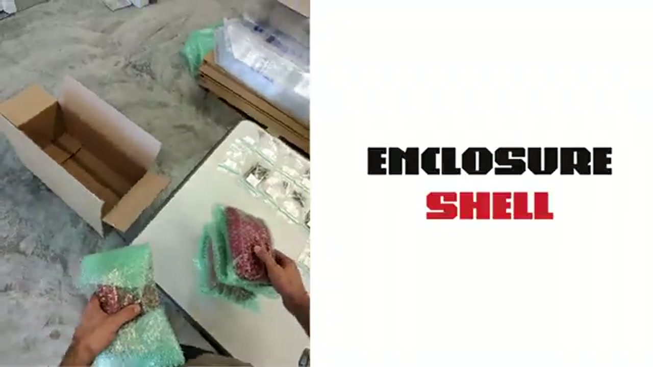 Enclosure panels being unwrapped during assembly, beside the manual's ENCLOSURE SHELL section title