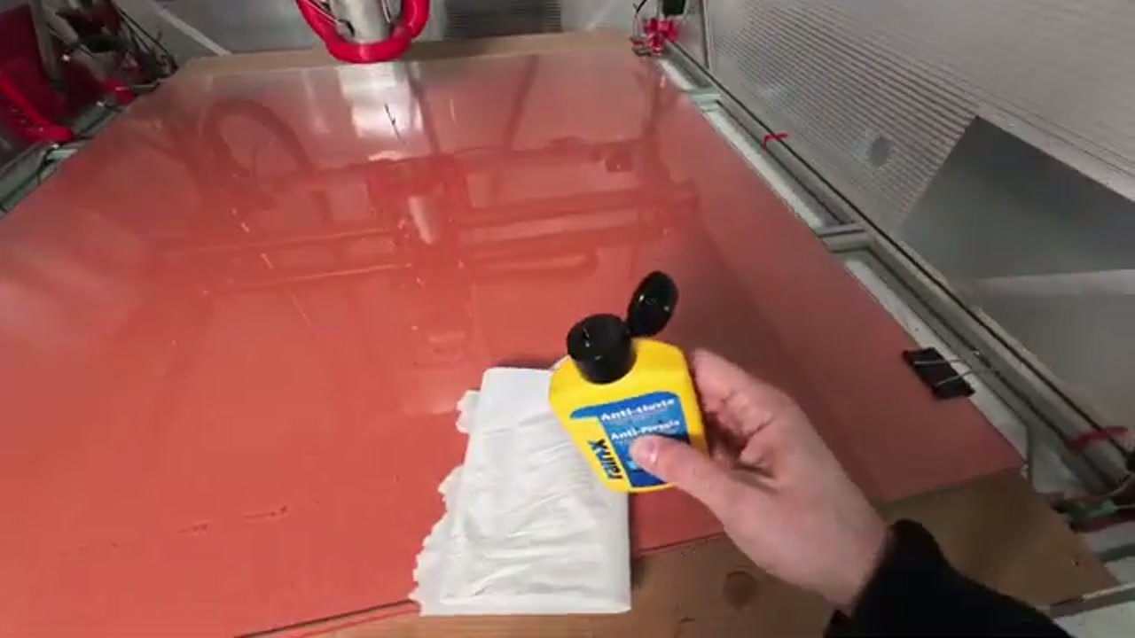 RainX bottle — automotive water repellent used as a release agent for PETG on glass