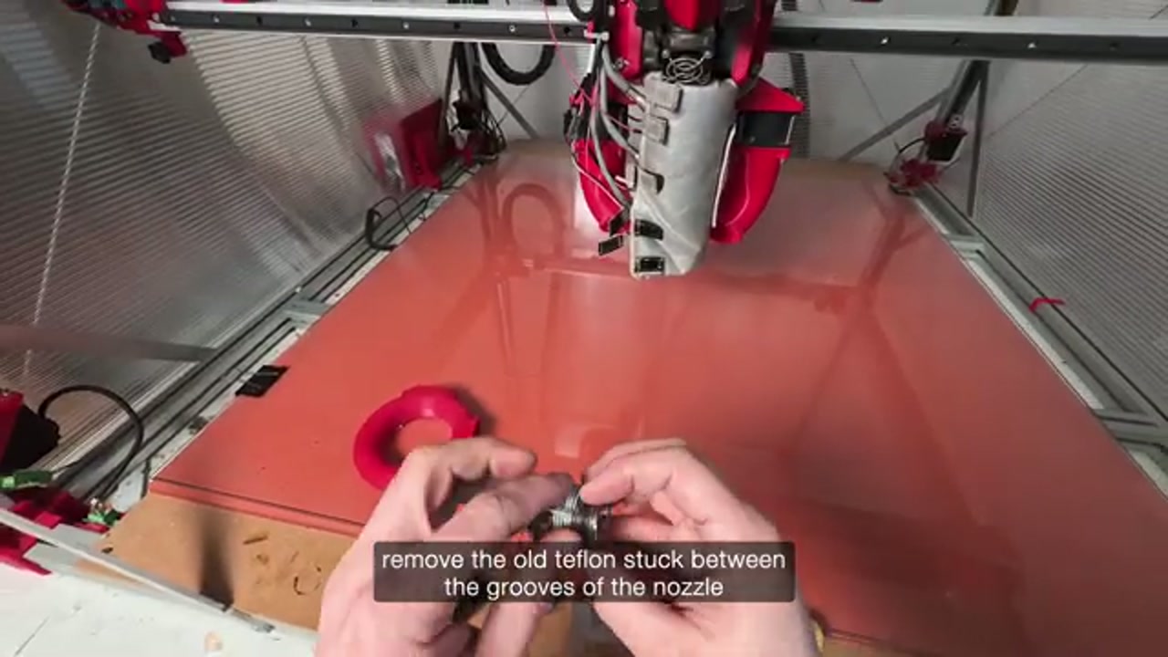 Removing old PTFE tape from the used nozzle