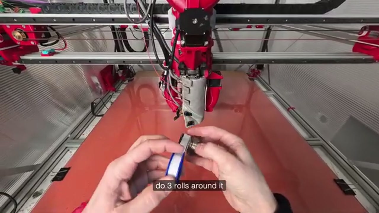 Wrapping PTFE tape 3 turns around the new nozzle thread